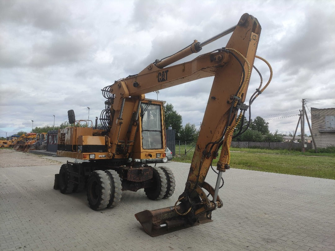 1992, CATEPILLAR 214B WHEEL EXCAVATOR